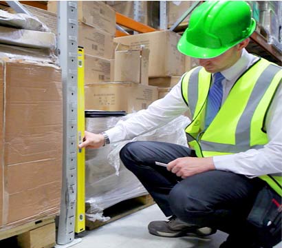 Inspecting warehouse racking